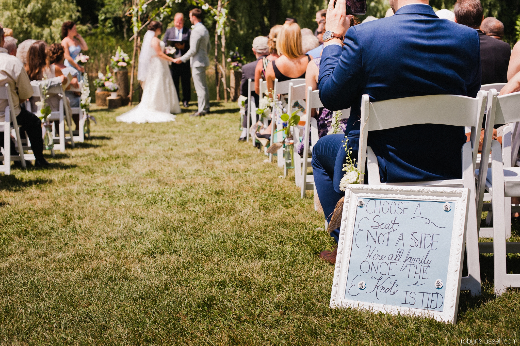 20-wedding-signage-at-ceremony-in-belwood-lake.jpg