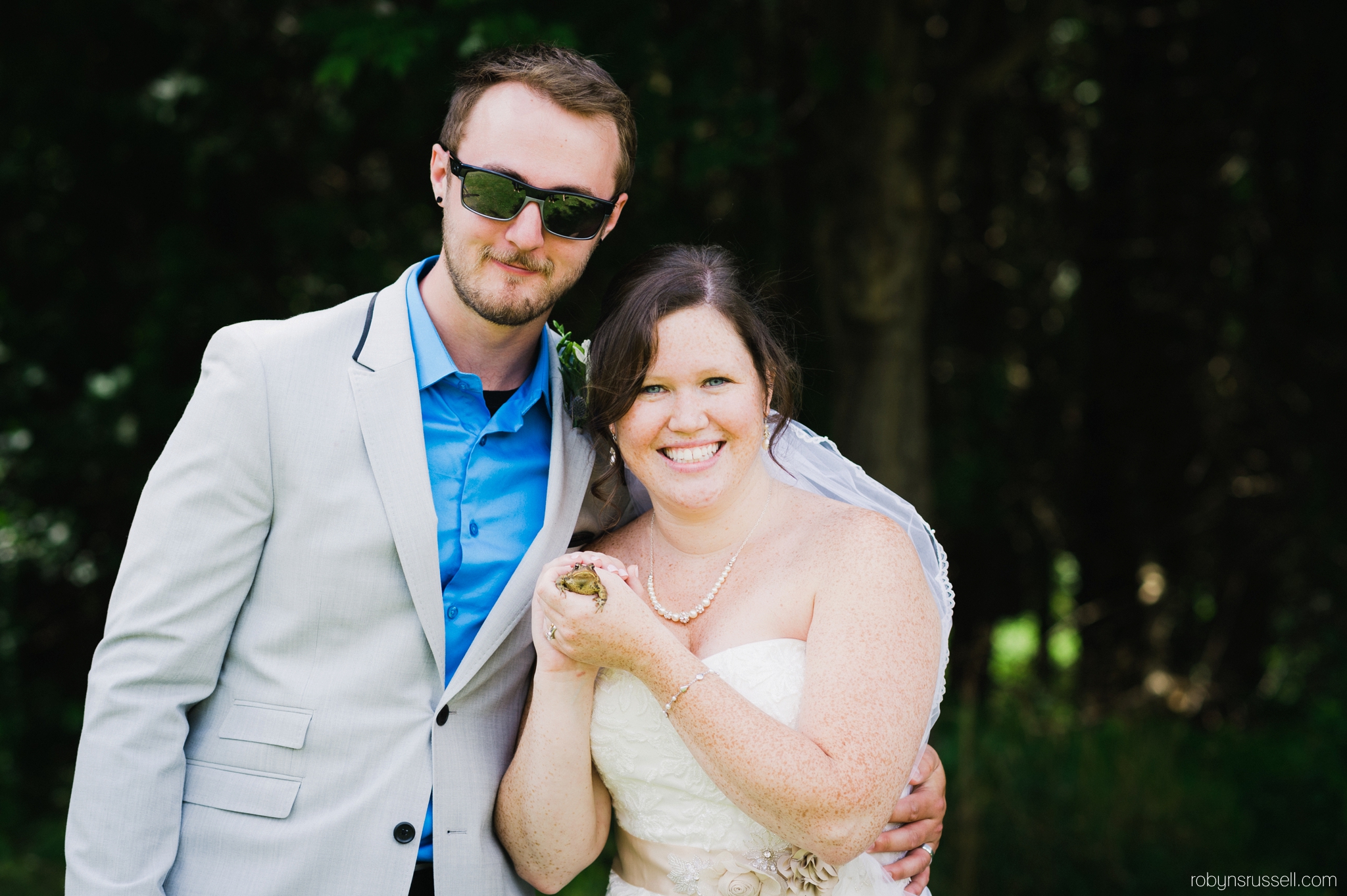 28-bride-and-groom-with-frog.jpg