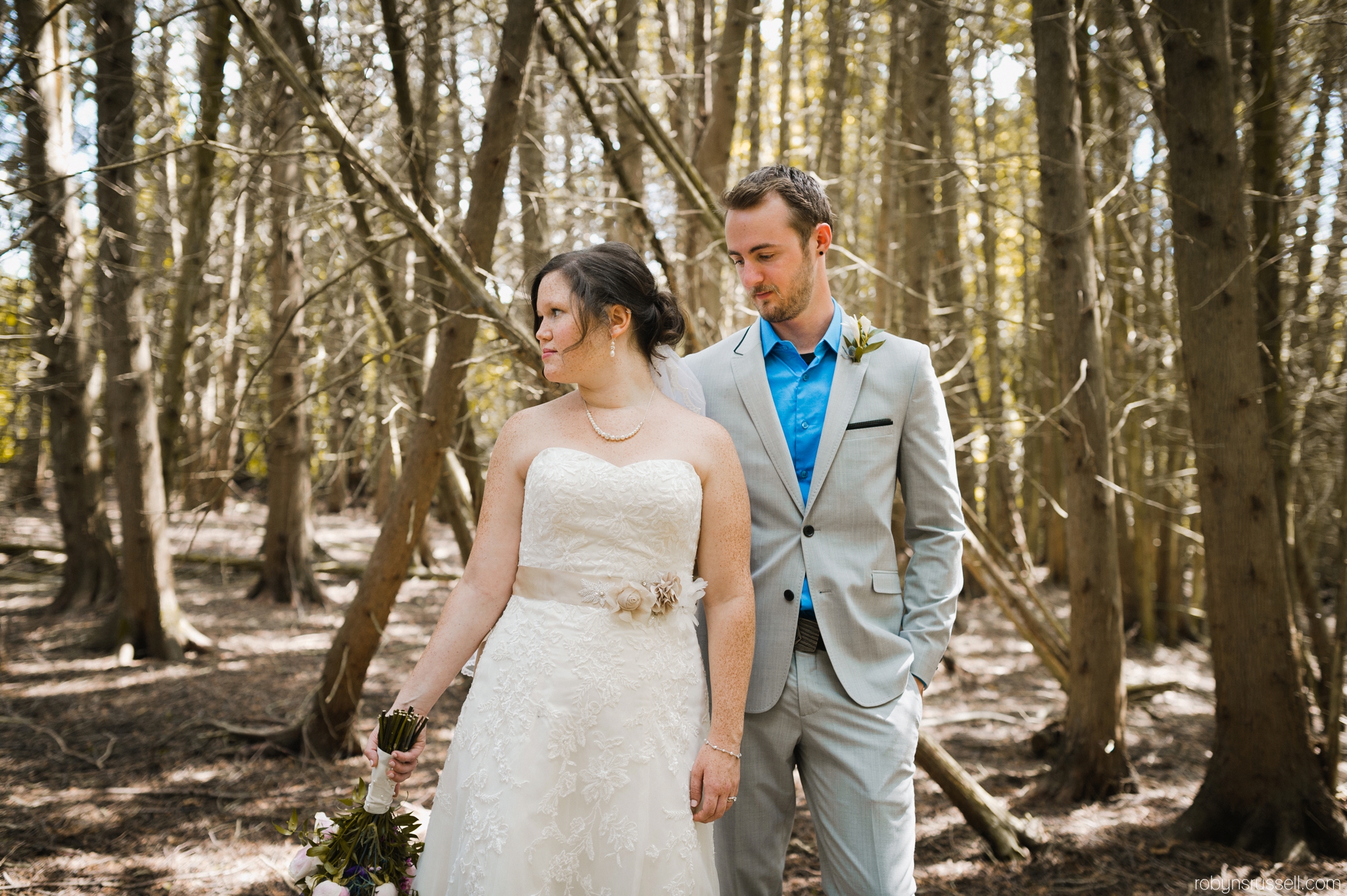 33-bride-and-groom-in-belwood-forest.jpg